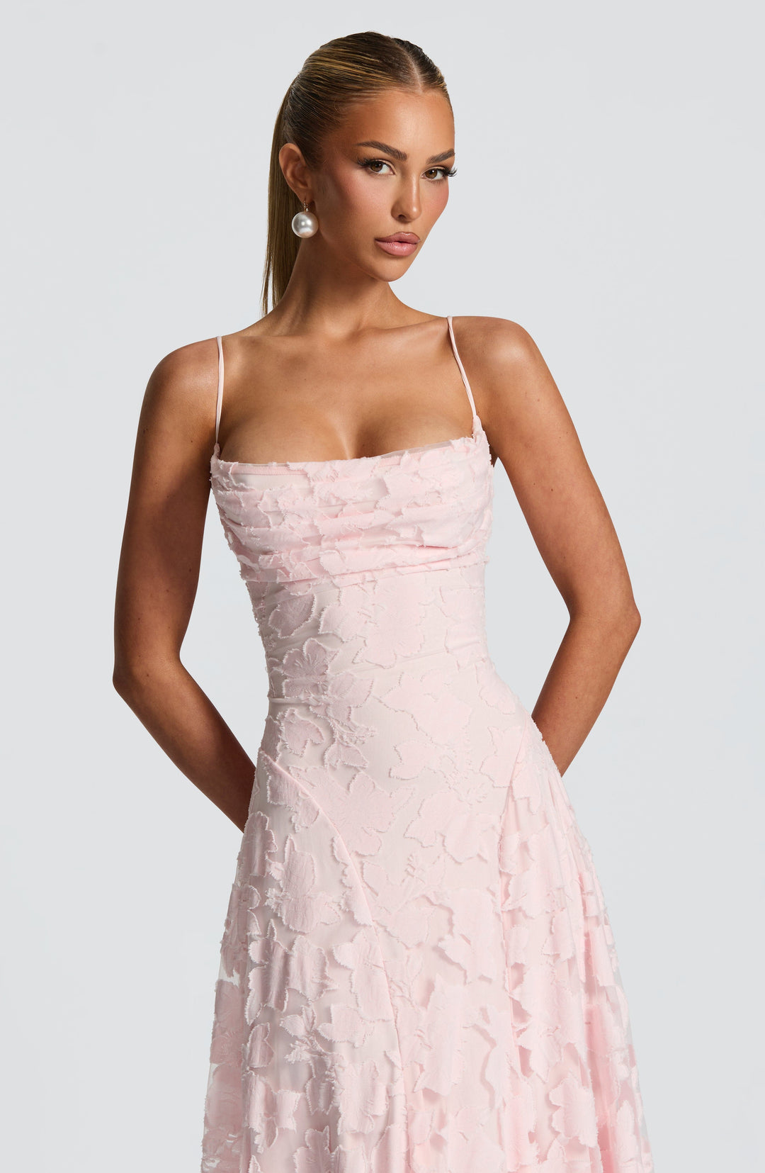Elegant women's evening gown, featuring a beautiful floral jacquard design & strappy style.