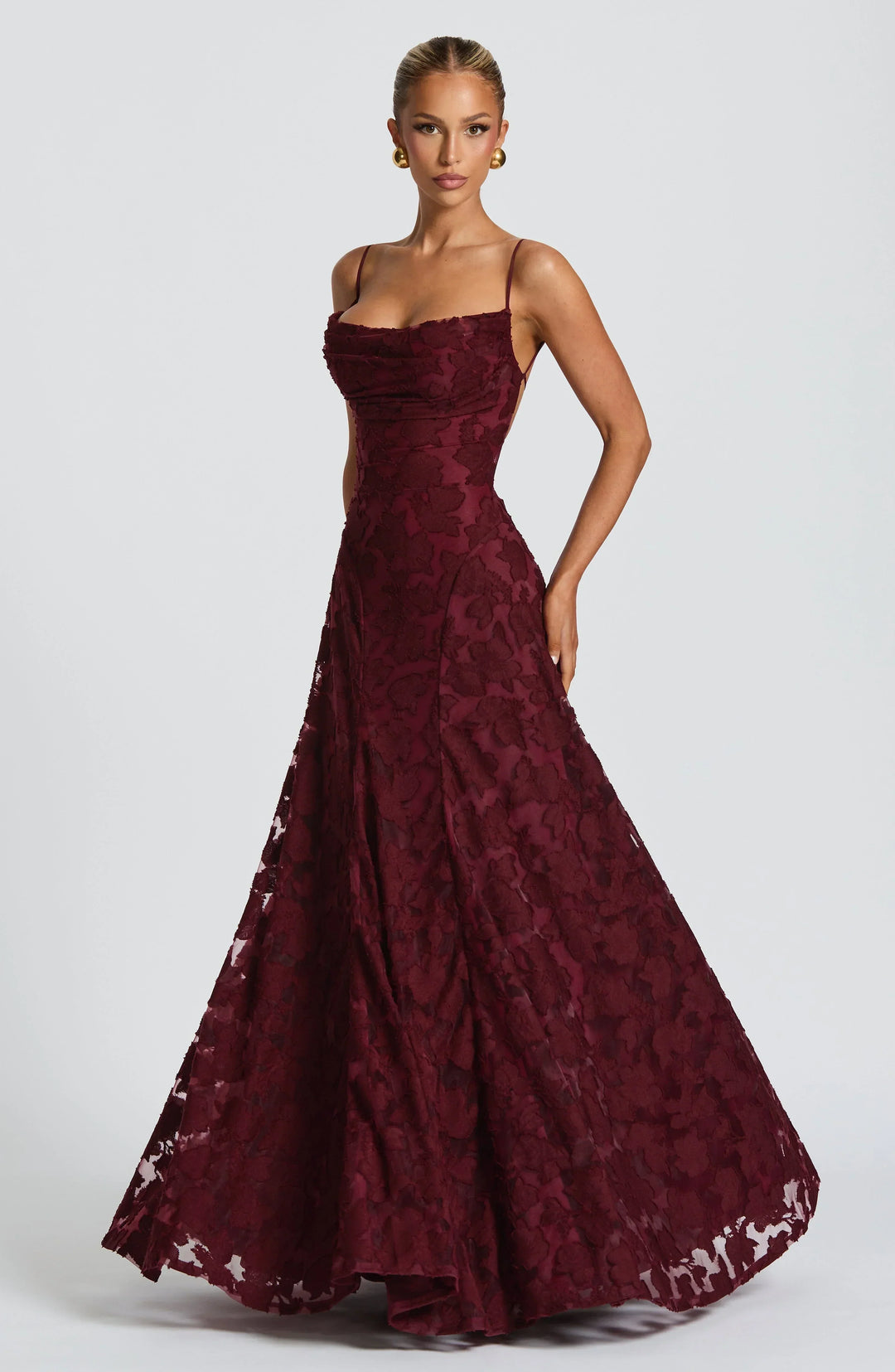 Women's formal evening gown with intricate floral jacquard pattern, elegant and stylish.