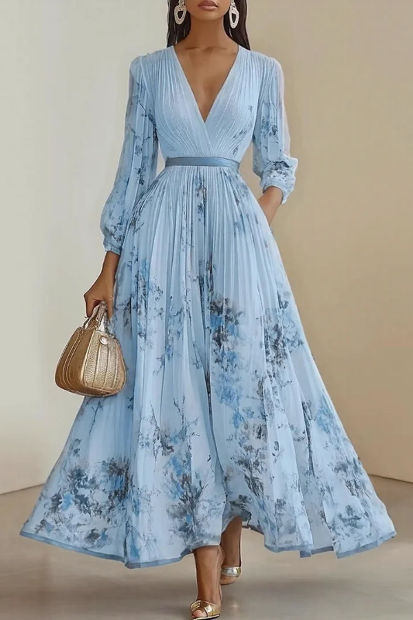 Flowing floral maxi dress for women featuring elegant long sleeves & a chic V-neck. Ideal for summer parties.