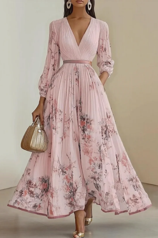 Women's elegant floral maxi dress with a flattering V-neck and long sleeves. Flowing design for parties & occasions.