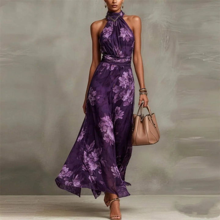 Beautiful women's floral pattern maxi dress. Halter neck, sleeveless, and ruched waist. Great for formal events.