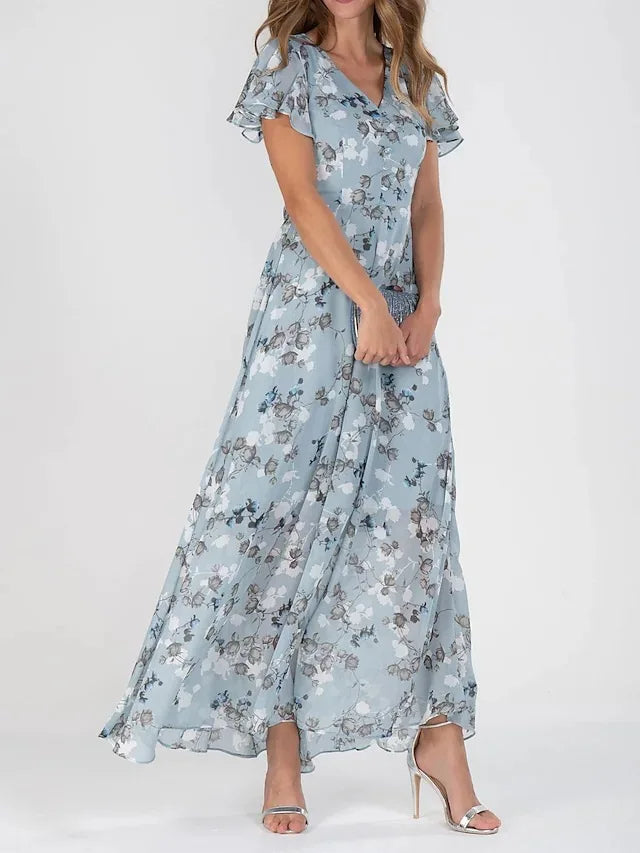 Chic women's V-neck floral maxi dress with elegant flutter sleeves. A comfortable and stylish summer or occasion dress.
