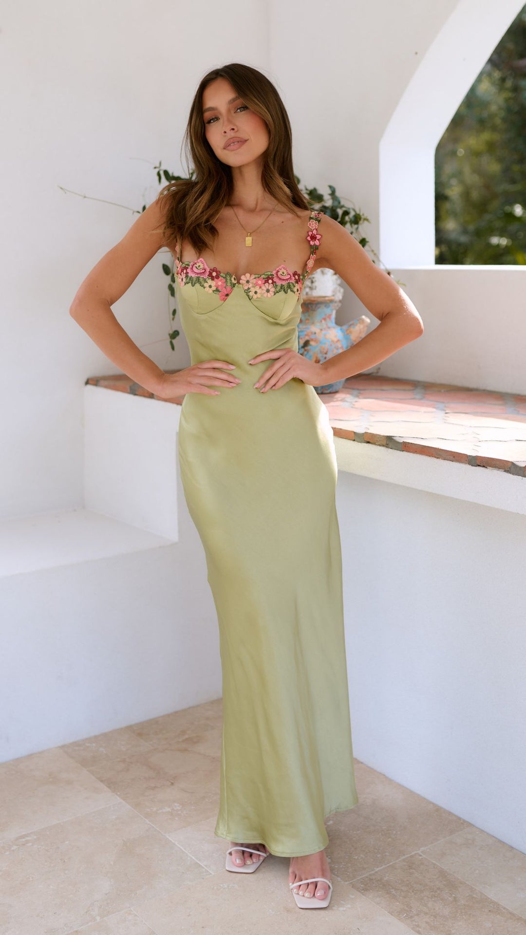 Beautiful women's elegant floral maxi dress with a slim strap design, great for warm weather.