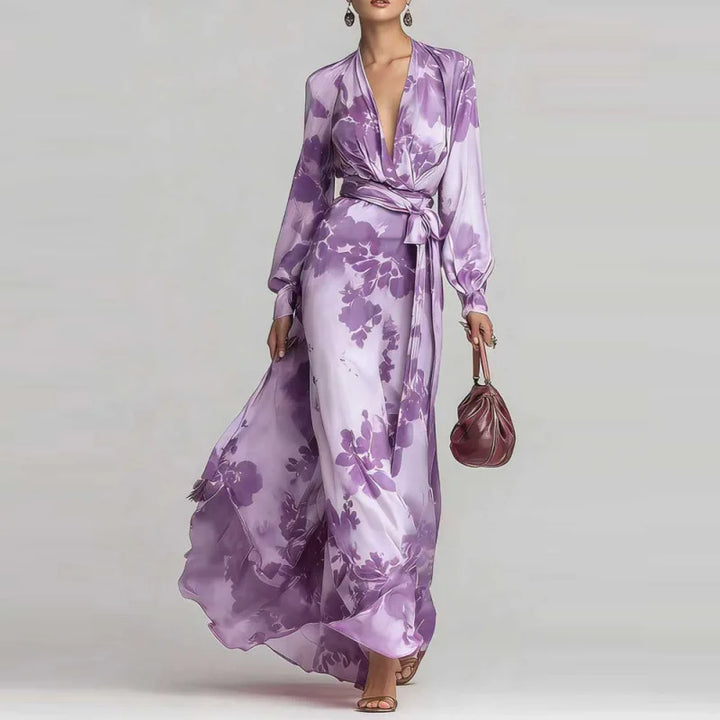 Flowy women's floral maxi dress, elegant summer style. Comfortable long dress with a charming print.