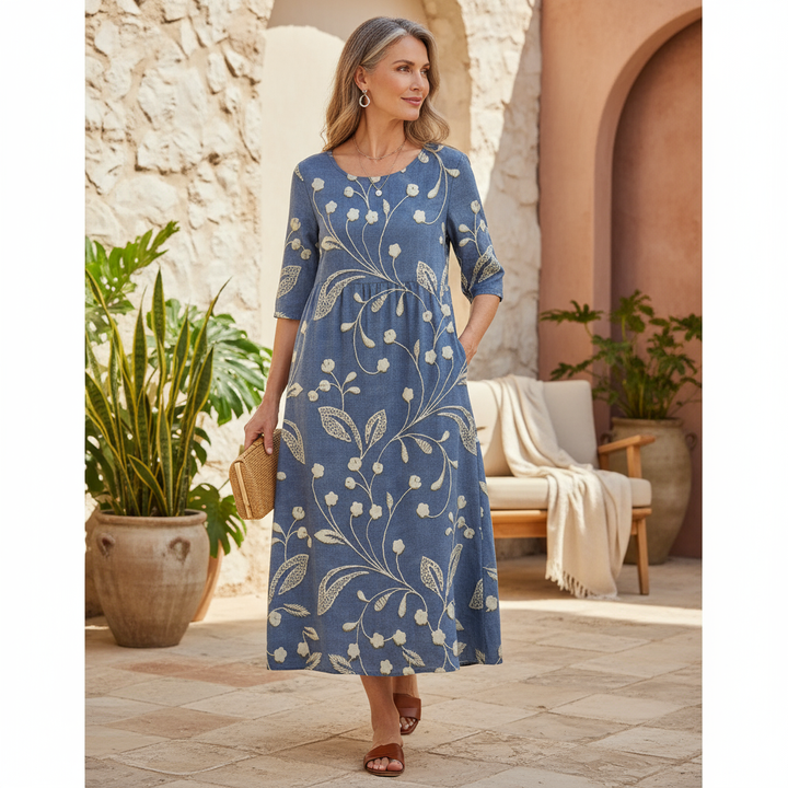 Elegant women's floral midi dress, perfect for spring/summer casual wear or a party. Comfortable and stylish.
