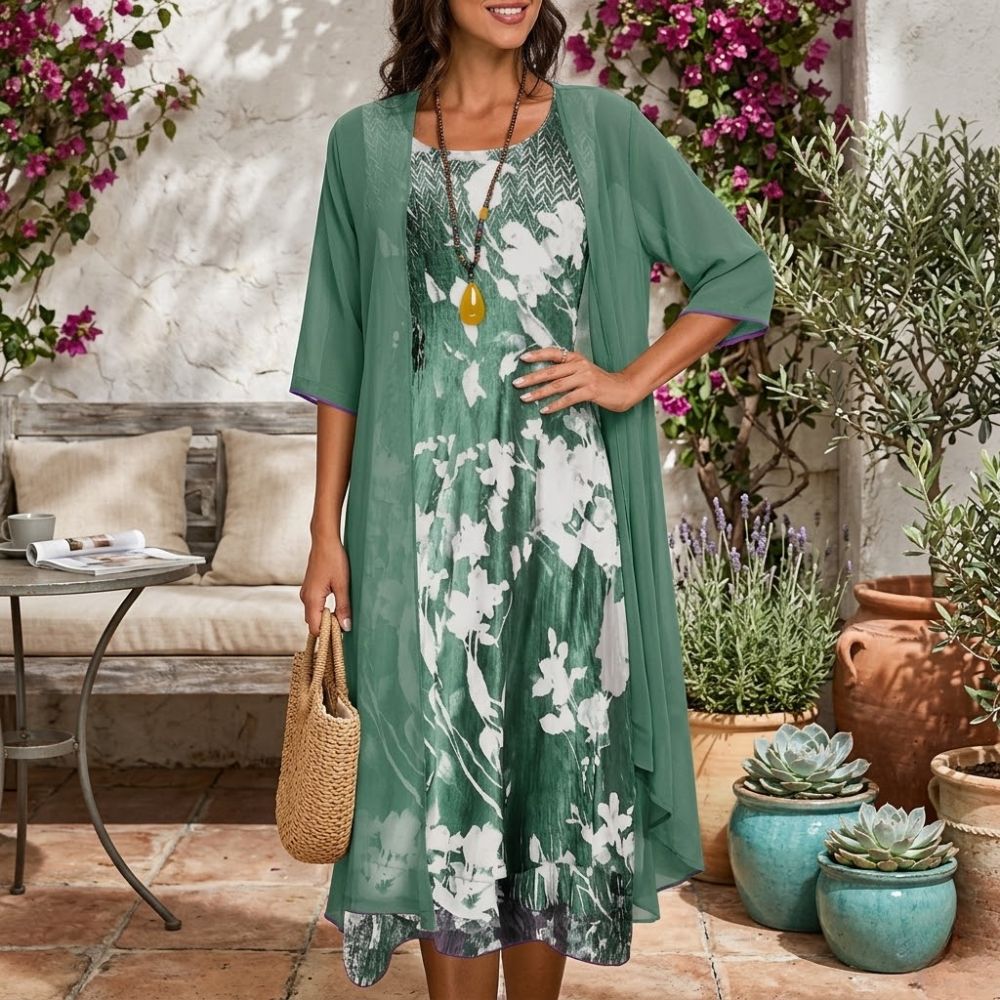 Elegant women's floral midi dress & sheer cardigan set for garden parties & wedding guests.