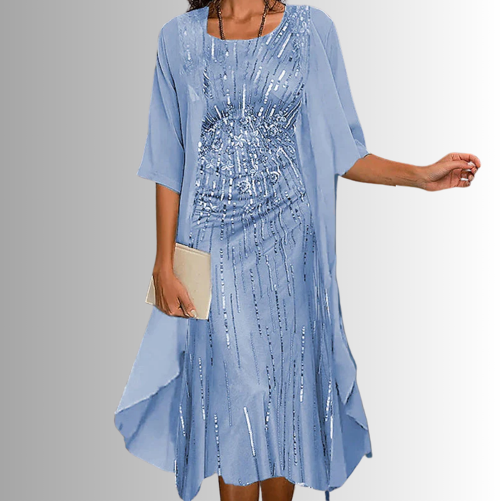 Chic women's floral midi dress with matching sheer cardigan, creating a graceful layered summer look.