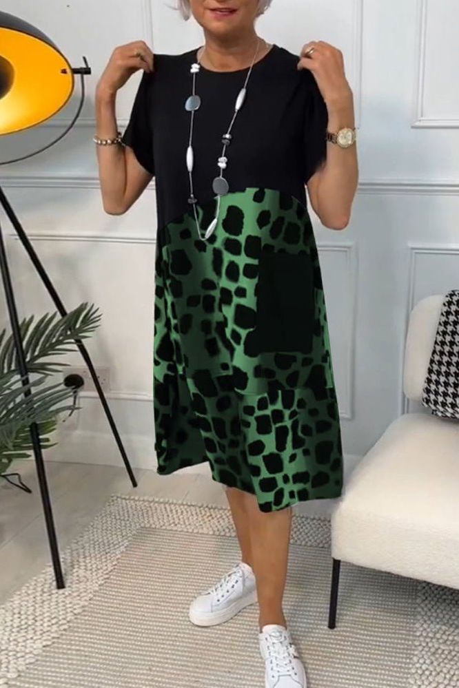 Elegant women's flowy floral midi dress with a chic defined waist, suitable for various occasions.