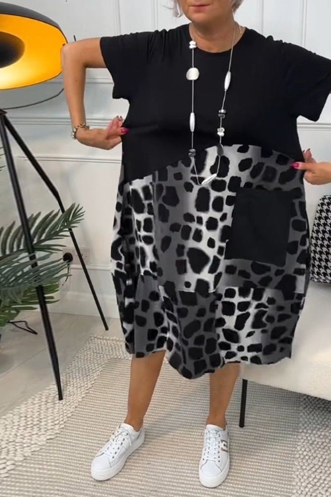 Stylish floral midi dress for women, with an elegant design and a comfortable waist-defined fit.