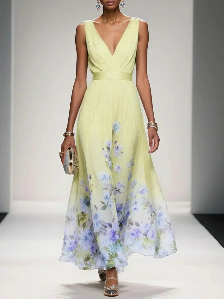 Flowy floral print midi dress for women, ideal for elegant occasion wear, vacations & summer parties.