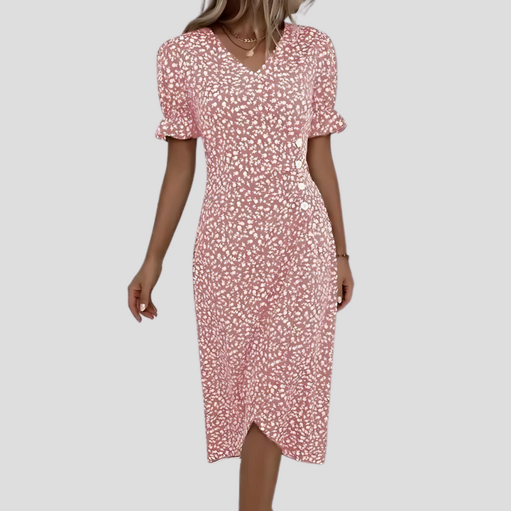 Casual yet elegant summer floral midi dress with short puff sleeves, ideal for beach outings or brunches.