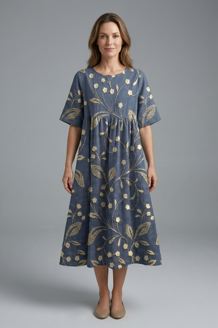 Beautiful floral print midi dress for women, featuring a round neck, short sleeves & a flared skirt.