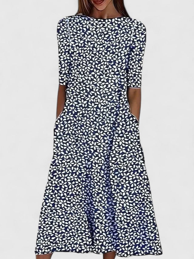 Sleeved women's floral midi dress, elegant & comfortable. Great as a summer day dress or vacation outfit.