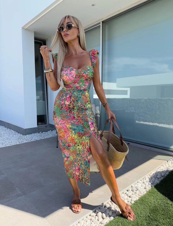 Elegant women's floral midi dress with side slit, ruffle straps & sweetheart neck for summer vacation.