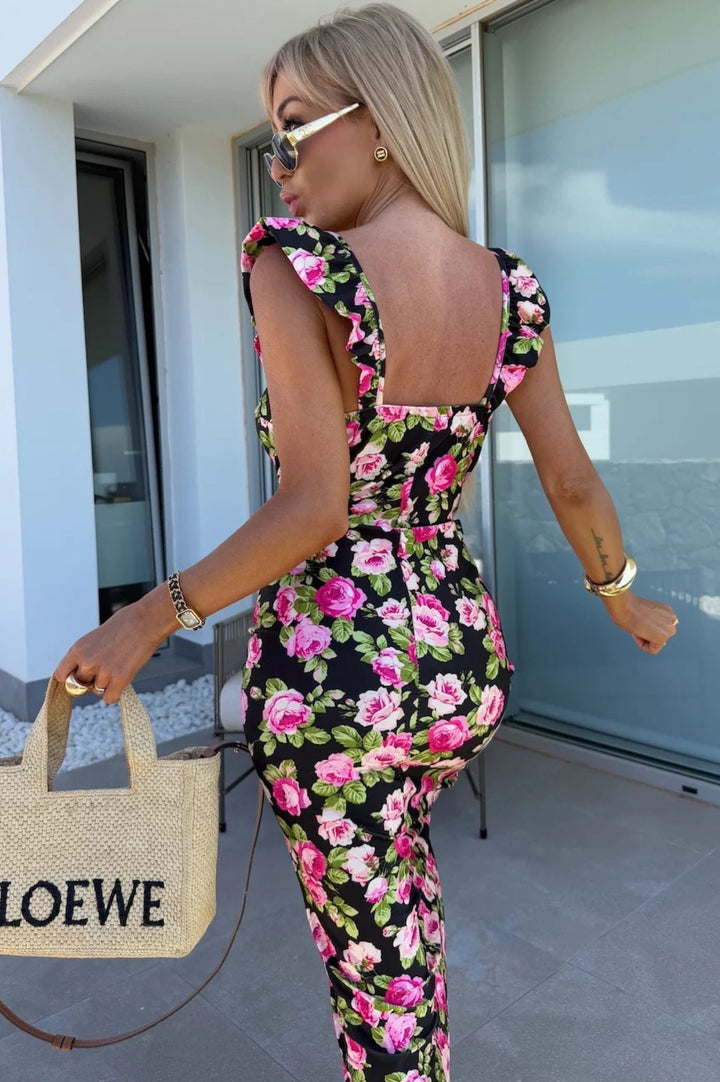 Pretty women's floral summer midi dress, elegant design, comfortable fit, perfect for day or evening wear.