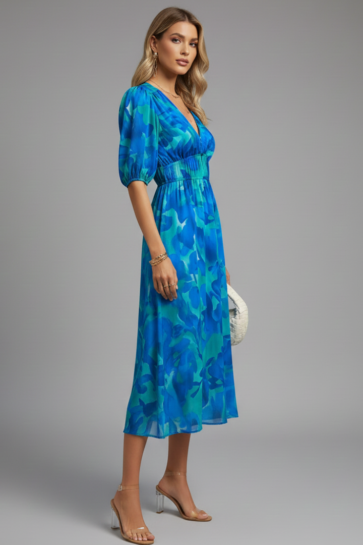 Stylish floral print midi dress for women, with chic puff sleeves, suitable for spring and summer.