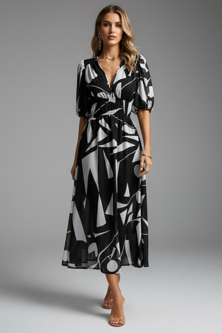 Versatile women's elegant floral print midi dress featuring fashionable puff sleeves for any occasion.