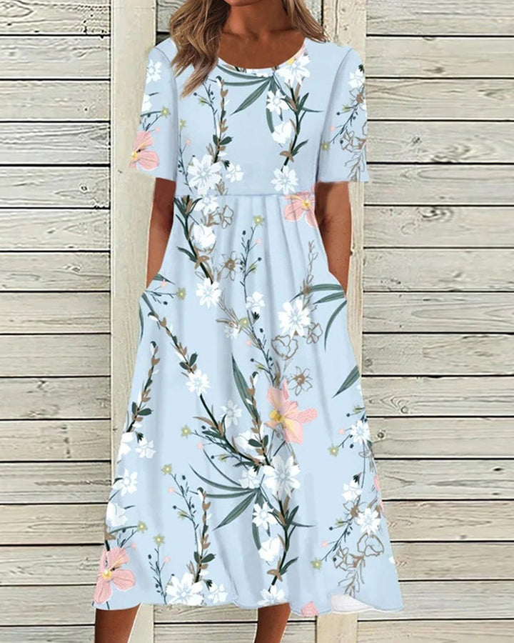 Elegant women's floral midi summer dress with round neck & short sleeves, perfect for casual daywear.