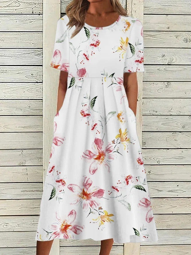 Stylish women's floral midi day dress for summer, featuring a comfortable round neck, short sleeves & elegant design.