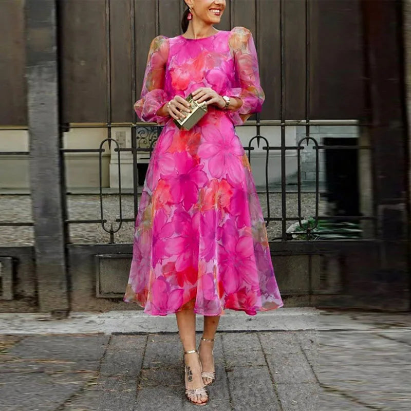 Elegant women's floral midi wedding guest dress with sheer sleeves, perfect for formal occasions