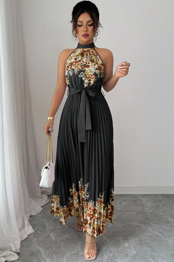Women's elegant floral midi dress with square neck and intricate pleats. A perfect vacation essential.