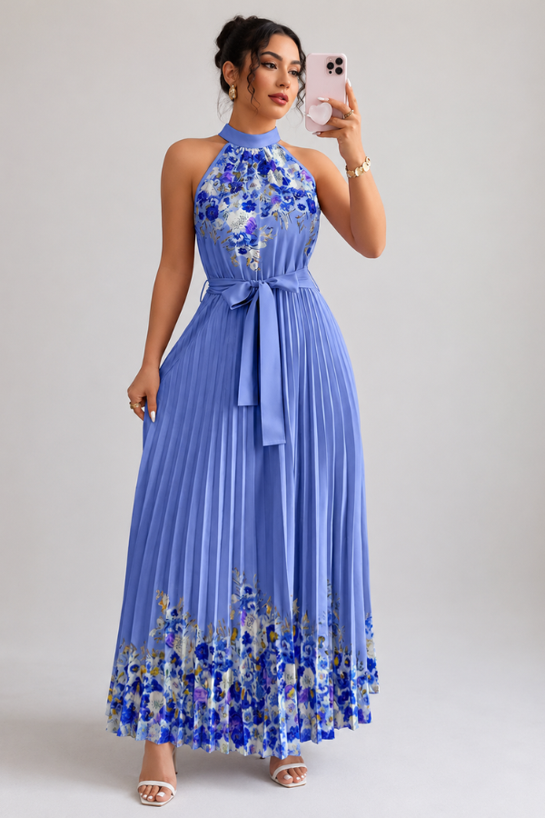 Side profile of a woman in an elegant floral pleated square neck midi dress. Summer fashion.