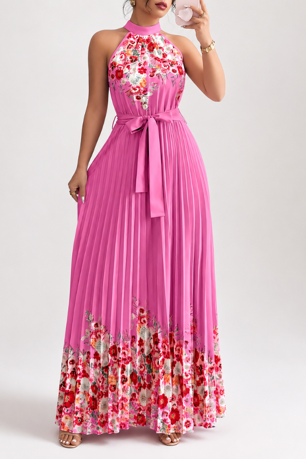 Women's pleated square neck midi dress with vibrant floral print on a hanger. Ready for summer.