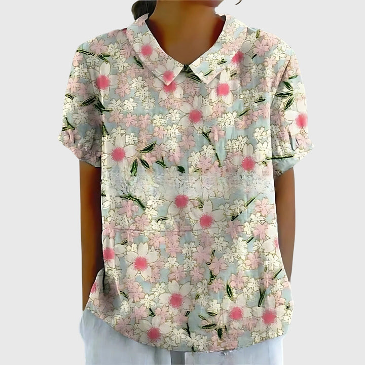 Versatile floral print women's blouse, perfect for casual or dressy spring outfits.