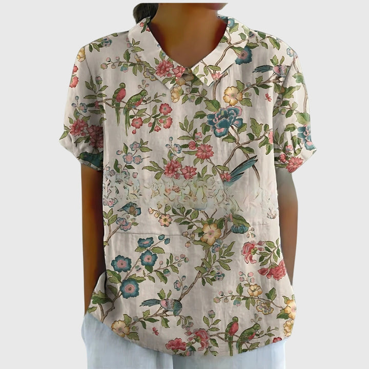 Women's elegant floral print blouse, a fashionable and loose fit summer top.