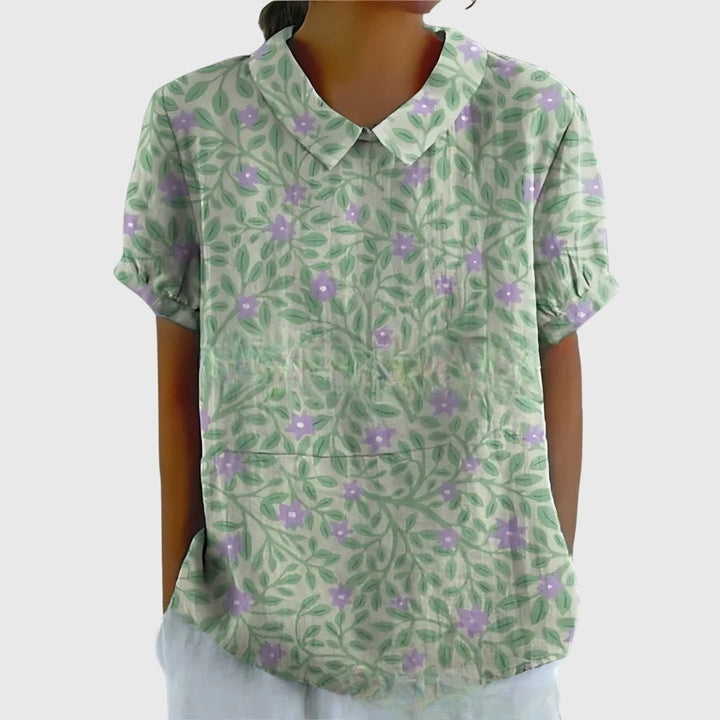 Chic floral print women's blouse, perfect for elegant casual summer outfits.