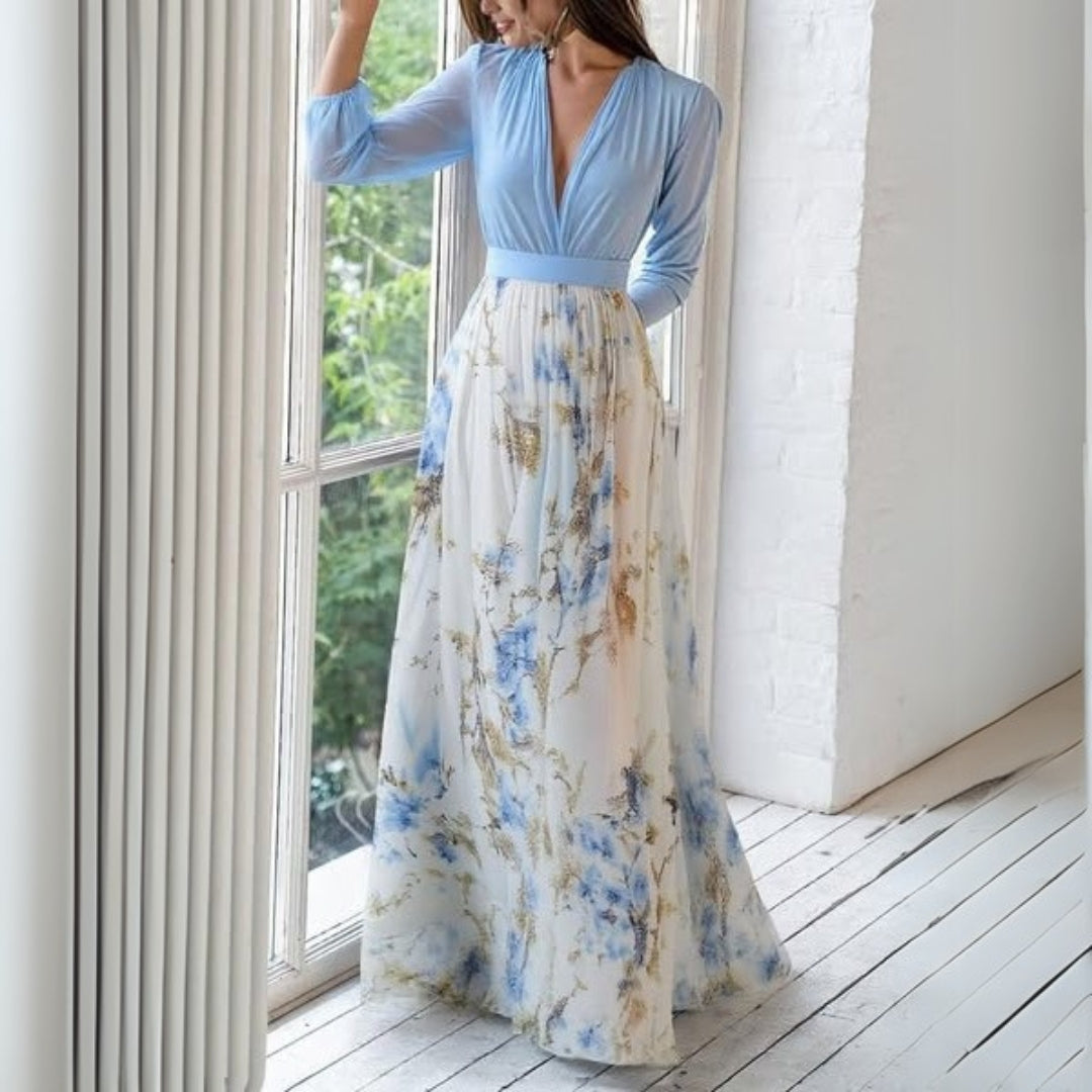 Flowing V-neck maxi dress for women in a vibrant floral print, ideal for a stylish day out