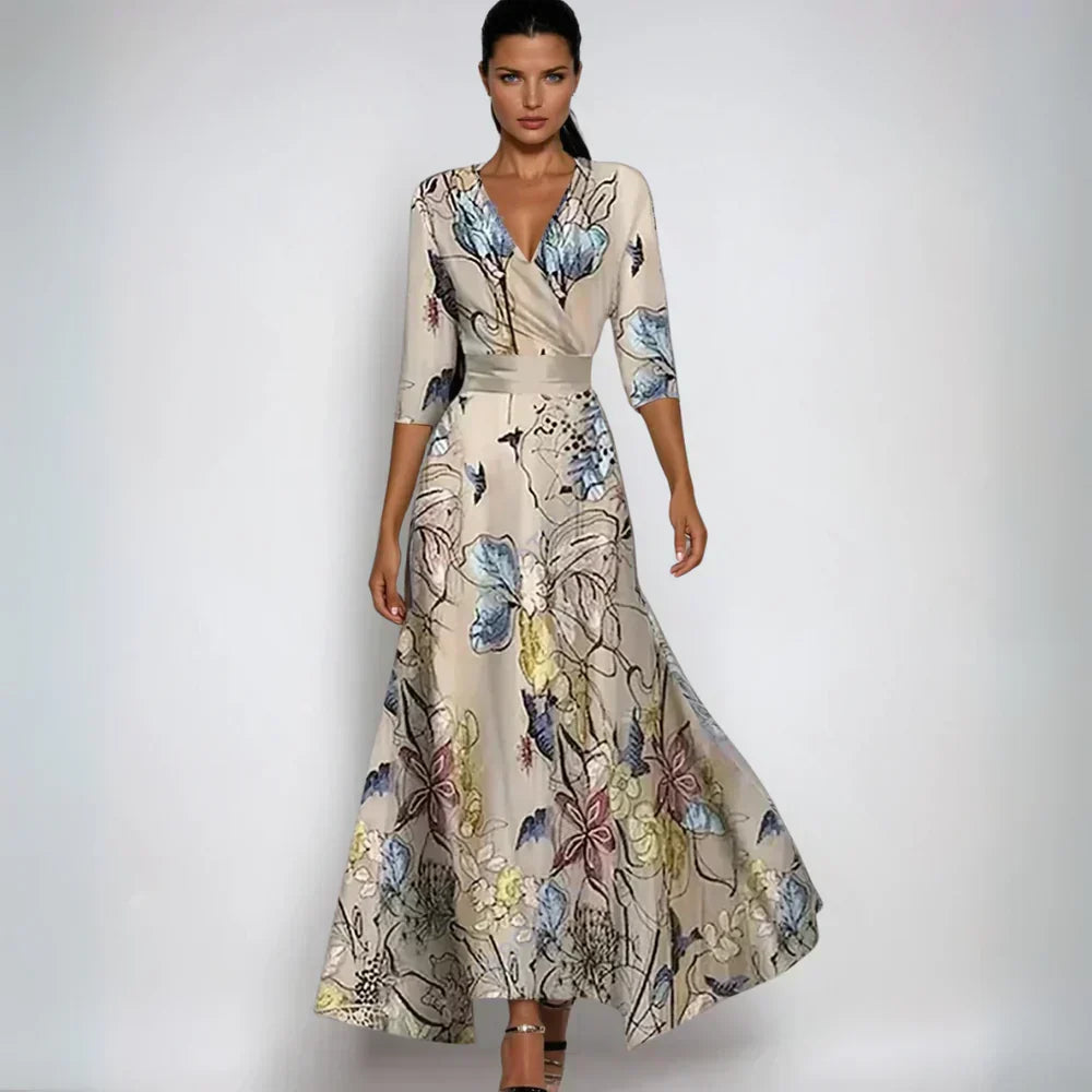Chic women's floral maxi wrap dress with V-neck & 3/4 sleeves, ideal for wedding guests & elegant evening wear.