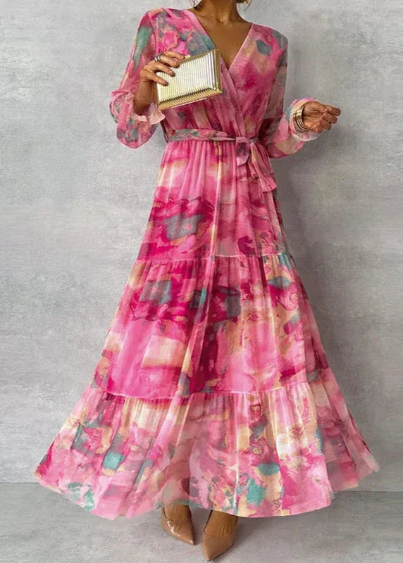 Elegant women's floral print wrap maxi dress featuring a V-neck and long sleeves, perfect for summer occasions.