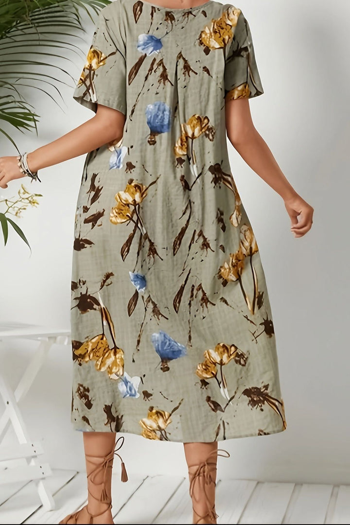 Stylish floral printed midi dress for women, suitable for both casual and elegant summer events.