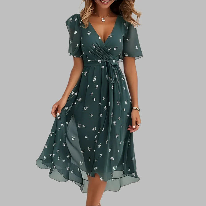 Stylish women's floral midi dress, ruched and elegant, ideal for parties, date nights, or spring events.