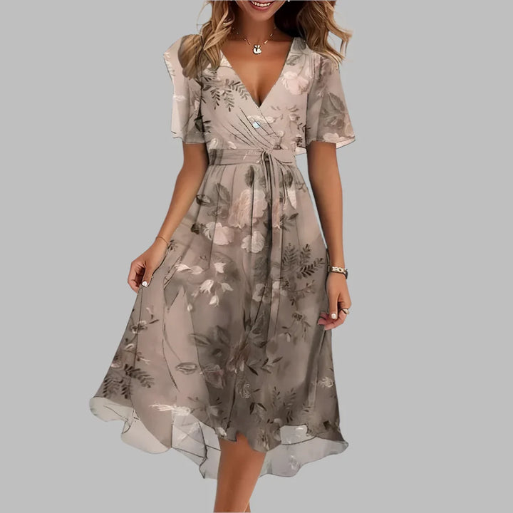 Beautiful women's floral ruched midi dress with a square neckline, offering an elegant and flattering look for spring.