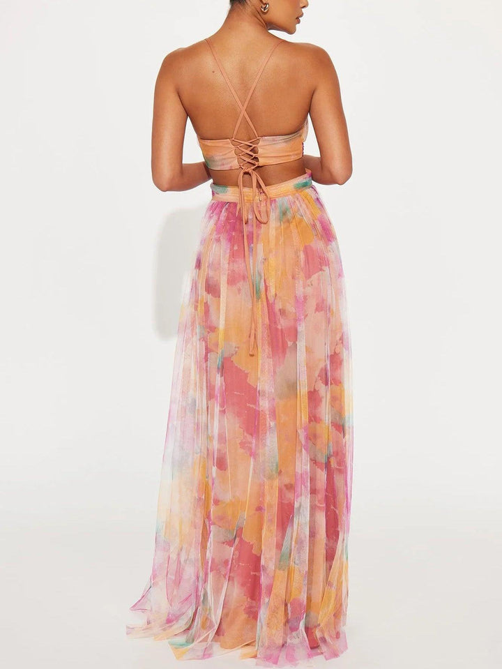 Flowy A-line women's floral sleeveless maxi dress, V-neck, perfect for elegant summer and party wear.