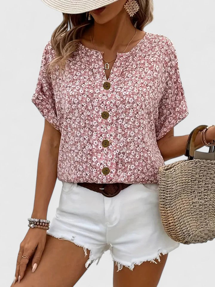 Elegant women's floral summer top with short sleeves. Perfect for casual wear, breezy and stylish. Vintage-inspired design.