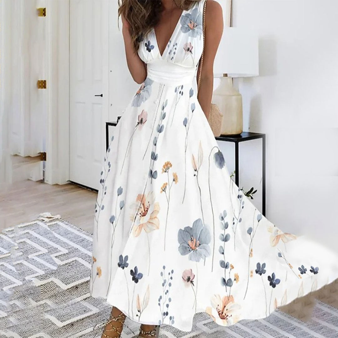 Stunning women's sleeveless maxi dress with a vibrant floral pattern and flattering V-neckline