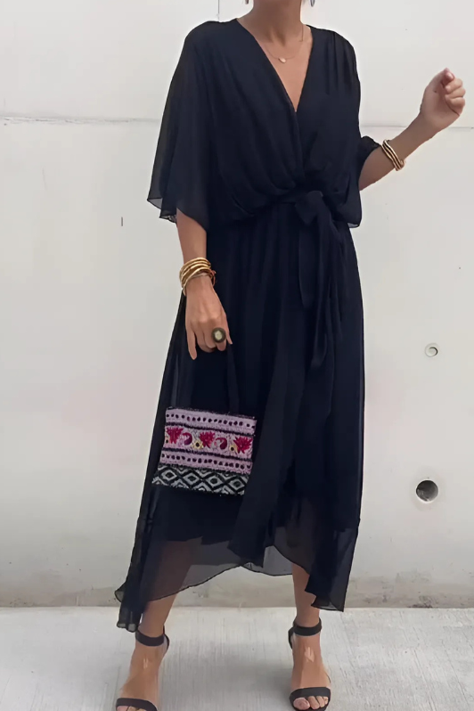 Elegant women's flowing maxi dress in Seren style, perfect for evening or holiday events. Available in plus sizes.