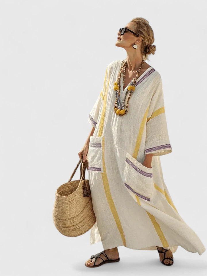 Fashionable women's elegant flowing maxi dress, a chic long occasion dress for modern style.