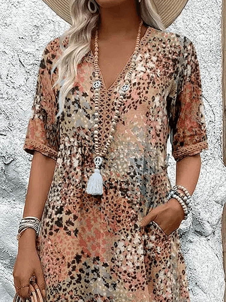Versatile women's flowing summer dress, 'Ocean Breeze' vibrant hues for casual, beach, or party wear.