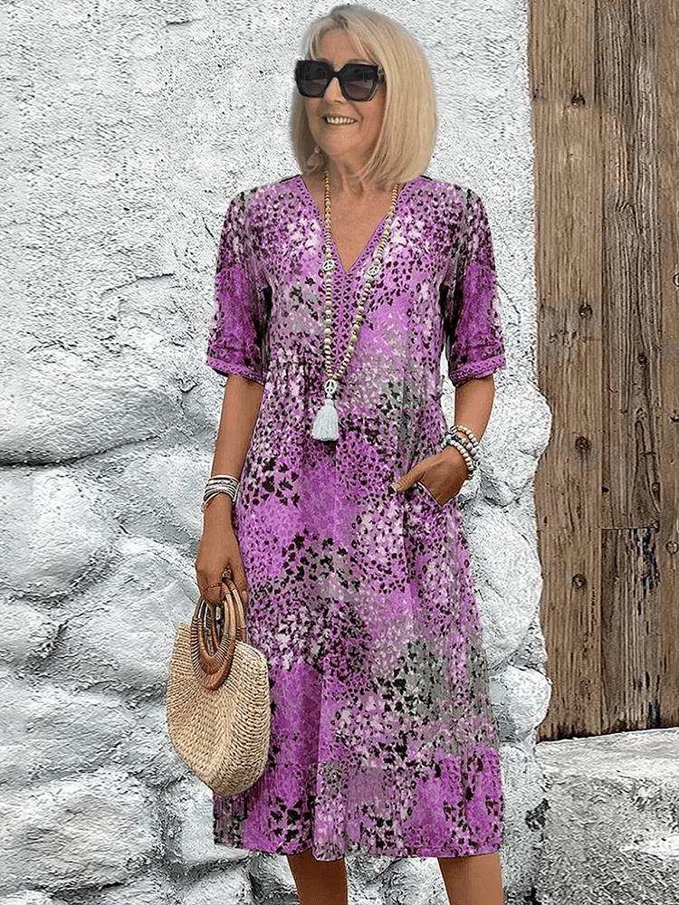 Vibrant 'Ocean Breeze' women's summer dress, flowing design, versatile for beach, casual, or elegant events.