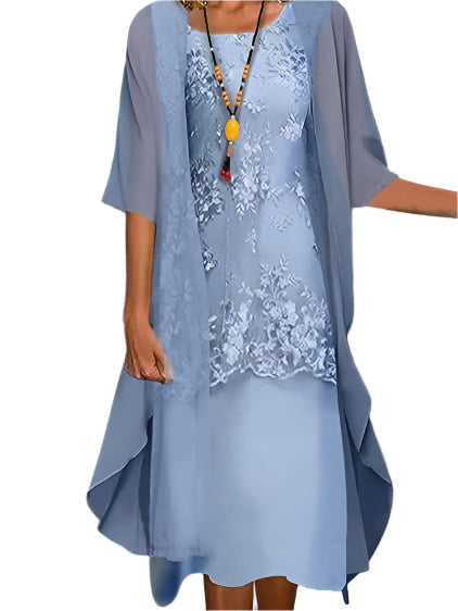 Elegant women's flowing midi dress with sheer lace sleeves, perfect for a wedding guest or formal evening event.