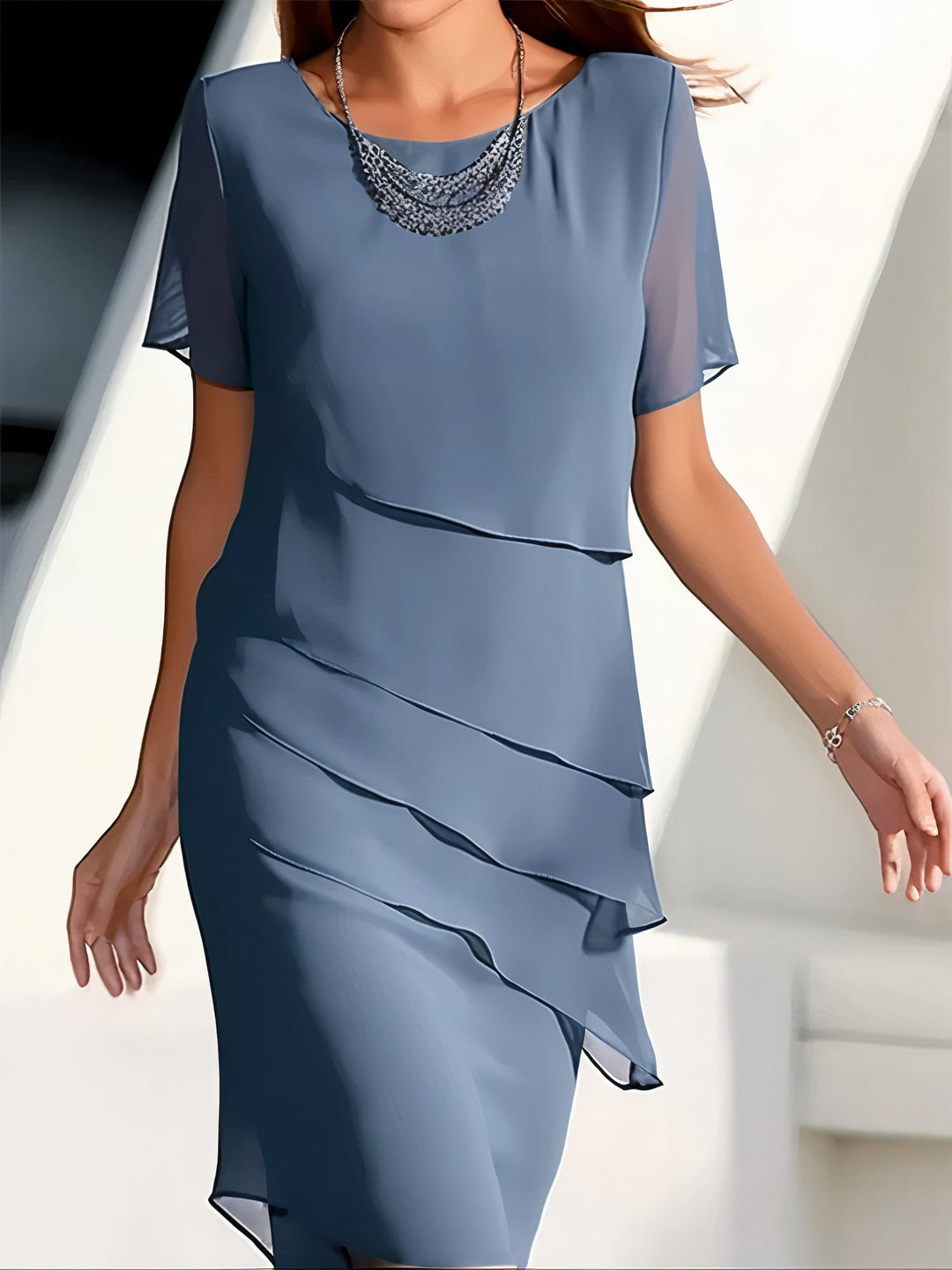 Women's versatile tiered dress with a flowing silhouette, ideal for spring fashion and summer occasionwear, relaxed fit.