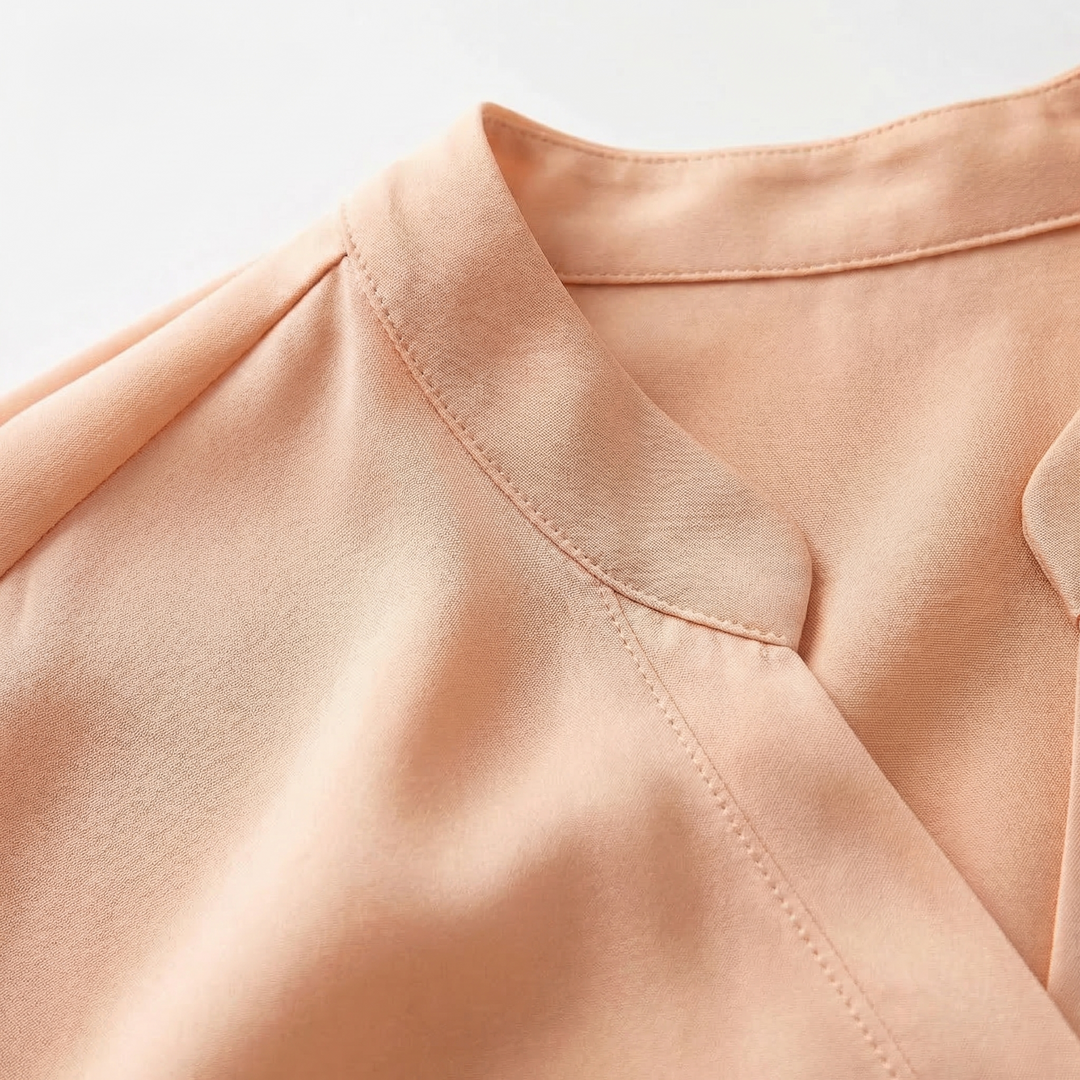 Women's elegant flowy blouse, versatile long sleeve top for office wear, casual chic, and sophisticated style.