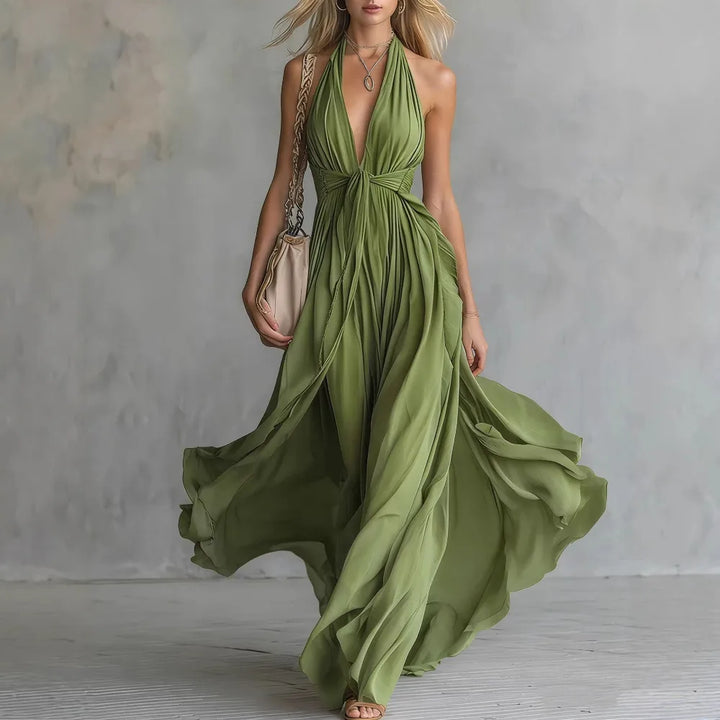 Beautiful women's flowy halter maxi dress, an elegant choice for any special occasion or evening event.