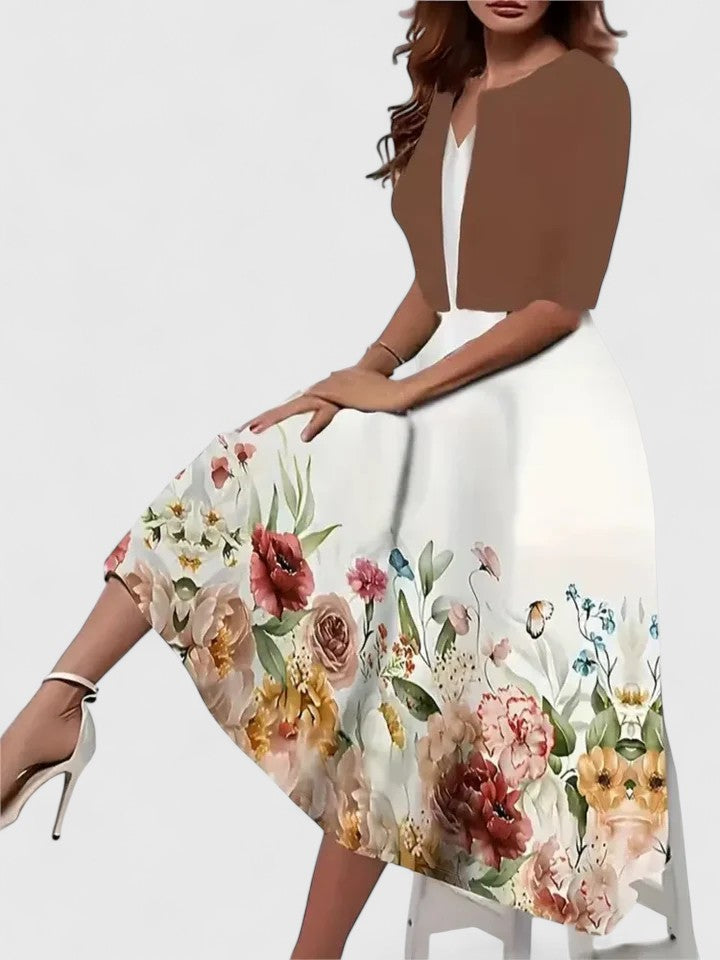 Elegant women's flowy midi dress in a chic versatile style, perfect for evening wear or special occasions.