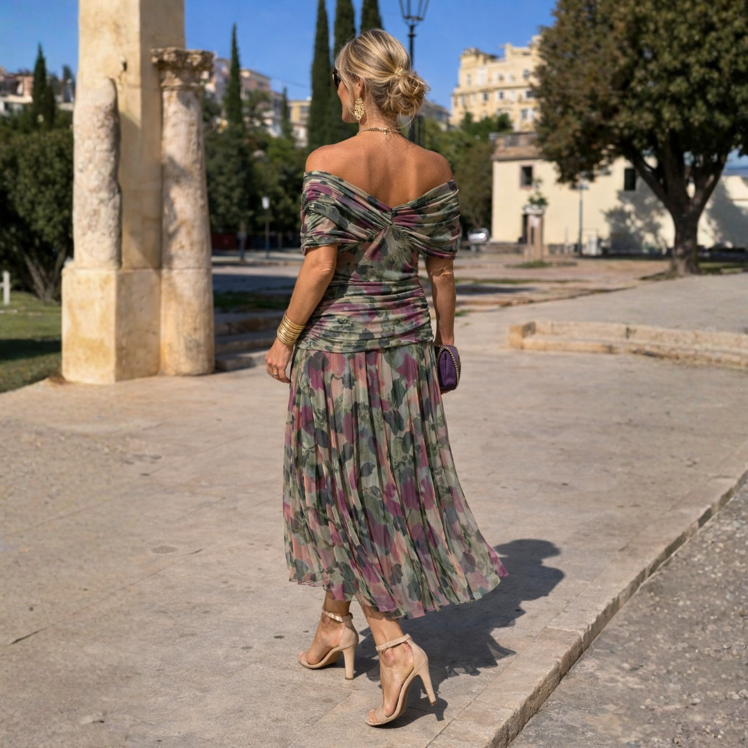Women's V-neck midi dress with gathered front, flutter sleeves. Perfect as a wedding guest outfit.