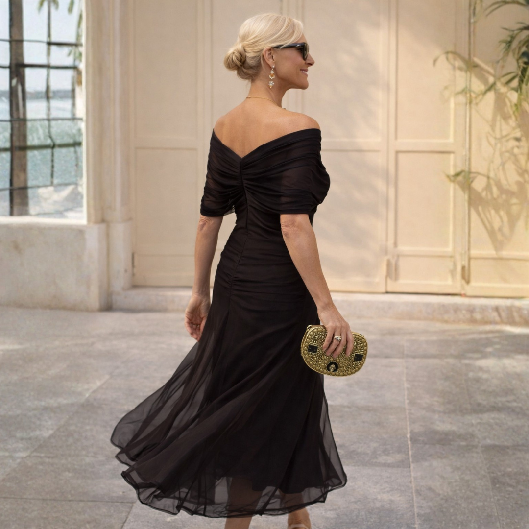 Chic women's midi dress: V-neck, gathered detail, flutter sleeves. Versatile for formal & cocktail.